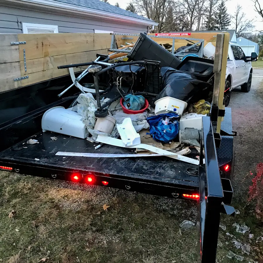 Roll-off dumpster delivered to a residential driveway in Lamesa